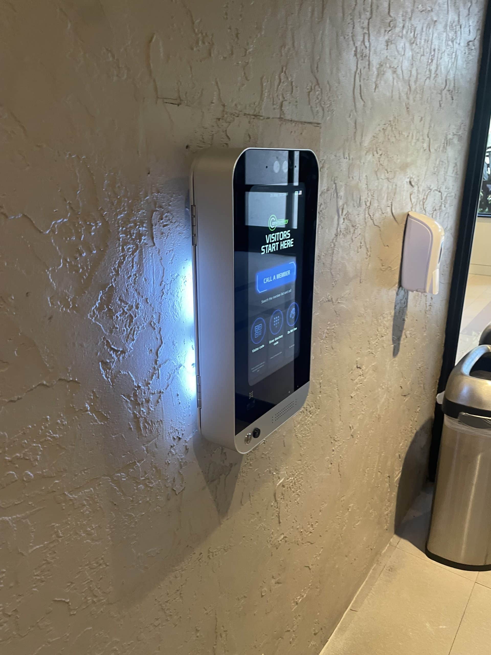Communikey-branded LobiBox indoor video intercom installed on a wall